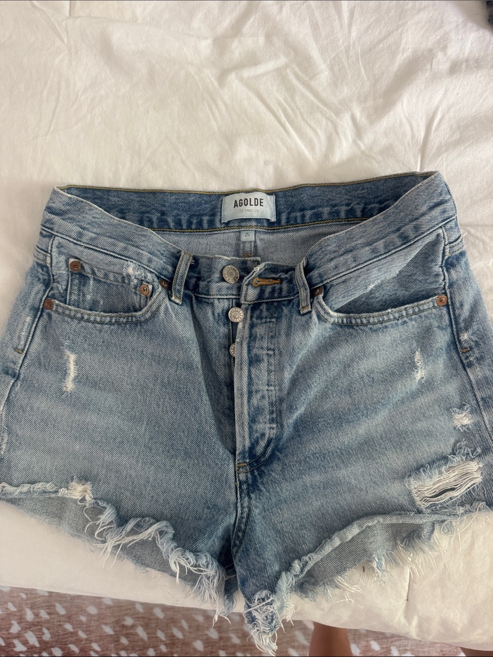 Agolde Faded Light Blue Distressed High-Rise Jean Shorts